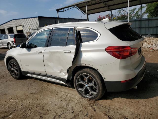 Photo 1 VIN: WBXHT3C32J5K25433 - BMW X1 