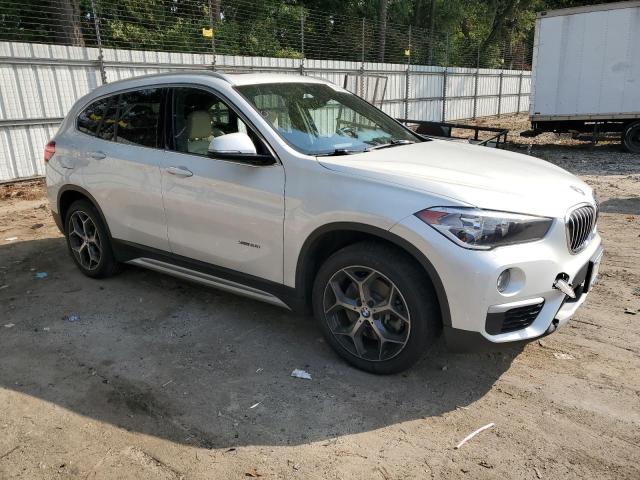 Photo 3 VIN: WBXHT3C32J5K25433 - BMW X1 