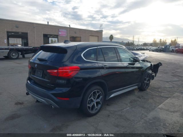 Photo 3 VIN: WBXHT3C32J5L26858 - BMW X1 