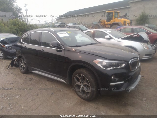 Photo 0 VIN: WBXHT3C32J5L26973 - BMW X1 