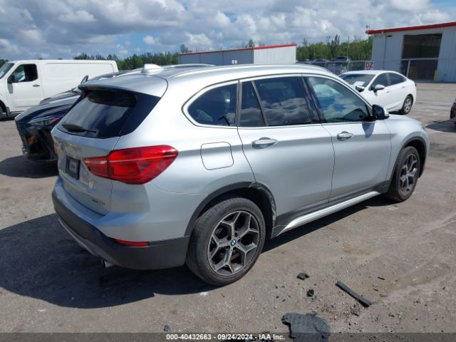 Photo 3 VIN: WBXHT3C32J5L31901 - BMW X1 