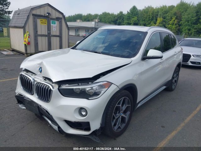 Photo 1 VIN: WBXHT3C32J5L33924 - BMW X1 