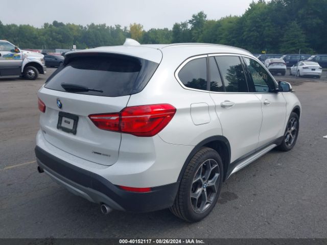 Photo 3 VIN: WBXHT3C32J5L33924 - BMW X1 