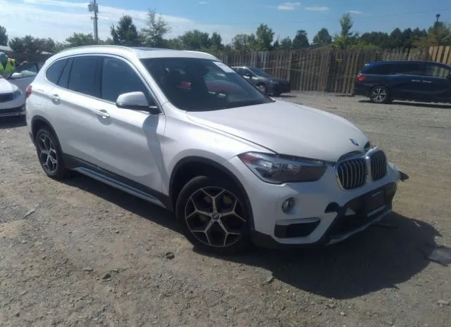 Photo 0 VIN: WBXHT3C32J5L34085 - BMW X1 