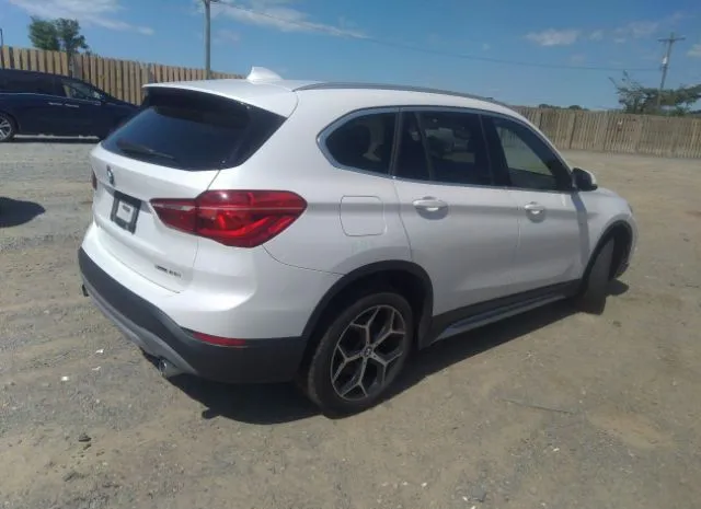 Photo 3 VIN: WBXHT3C32J5L34085 - BMW X1 