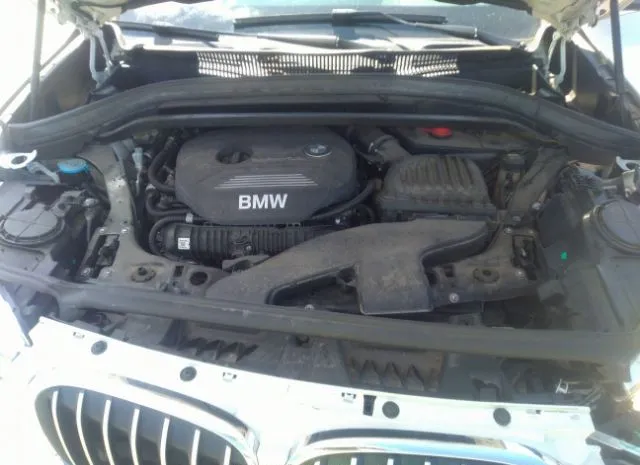 Photo 9 VIN: WBXHT3C32J5L34085 - BMW X1 