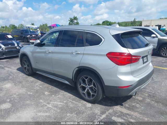 Photo 2 VIN: WBXHT3C33G5E48205 - BMW X1 