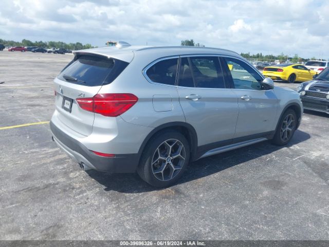 Photo 3 VIN: WBXHT3C33G5E48205 - BMW X1 