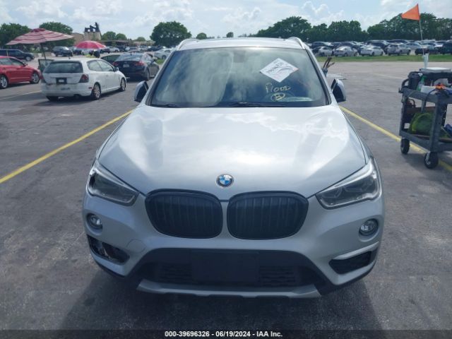 Photo 5 VIN: WBXHT3C33G5E48205 - BMW X1 