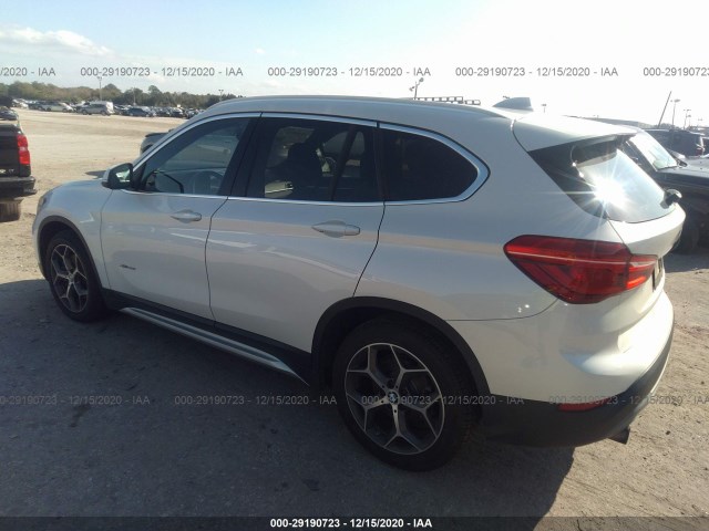 Photo 2 VIN: WBXHT3C33G5E48723 - BMW X1 