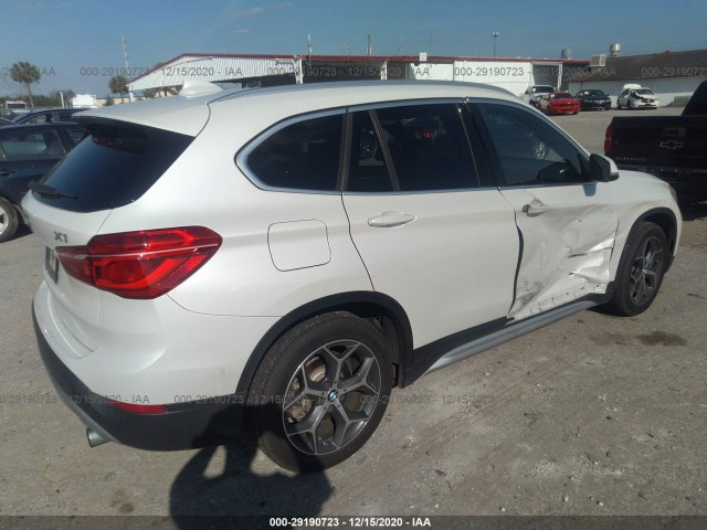 Photo 3 VIN: WBXHT3C33G5E48723 - BMW X1 