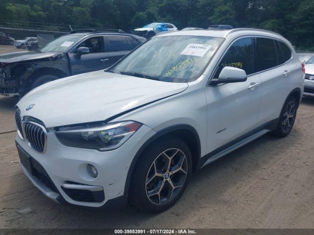 Photo 1 VIN: WBXHT3C33G5E51444 - BMW X1 