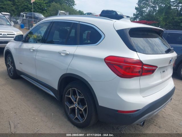 Photo 2 VIN: WBXHT3C33G5E51444 - BMW X1 