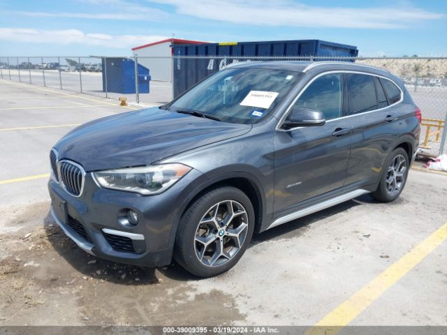 Photo 1 VIN: WBXHT3C33G5E52108 - BMW X1 