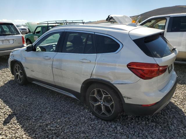 Photo 1 VIN: WBXHT3C33G5E53808 - BMW X1 