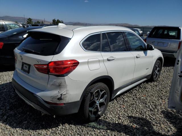 Photo 2 VIN: WBXHT3C33G5E53808 - BMW X1 