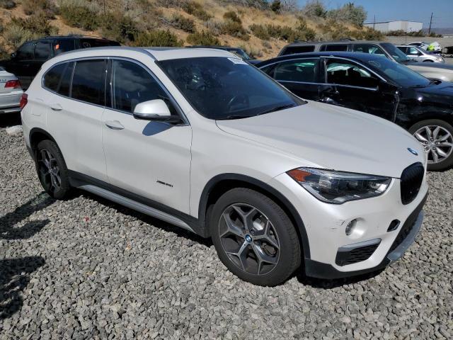 Photo 3 VIN: WBXHT3C33G5E53808 - BMW X1 