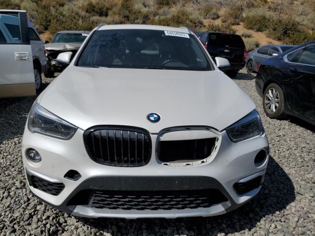 Photo 4 VIN: WBXHT3C33G5E53808 - BMW X1 