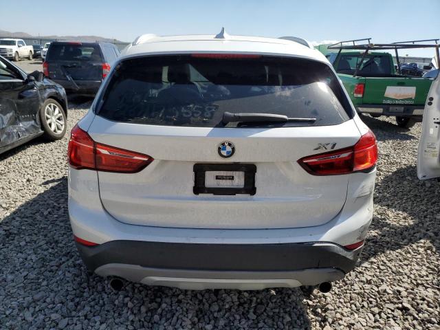 Photo 5 VIN: WBXHT3C33G5E53808 - BMW X1 