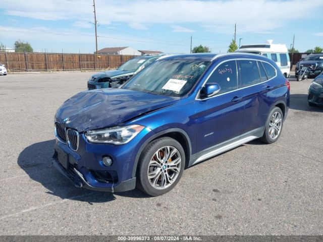 Photo 1 VIN: WBXHT3C33G5E54151 - BMW X1 