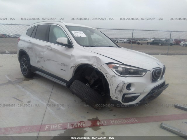 Photo 0 VIN: WBXHT3C33G5E56370 - BMW X1 