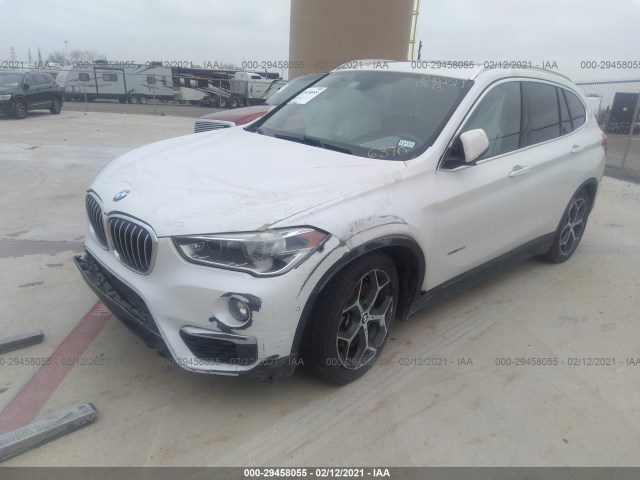 Photo 1 VIN: WBXHT3C33G5E56370 - BMW X1 