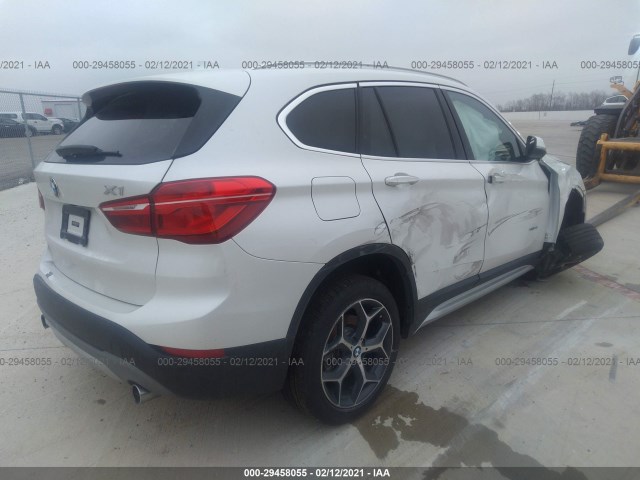 Photo 3 VIN: WBXHT3C33G5E56370 - BMW X1 