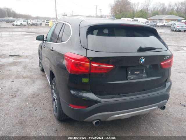 Photo 2 VIN: WBXHT3C33G5F64004 - BMW X1 