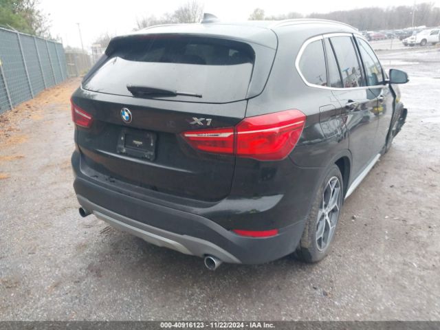 Photo 3 VIN: WBXHT3C33G5F64004 - BMW X1 