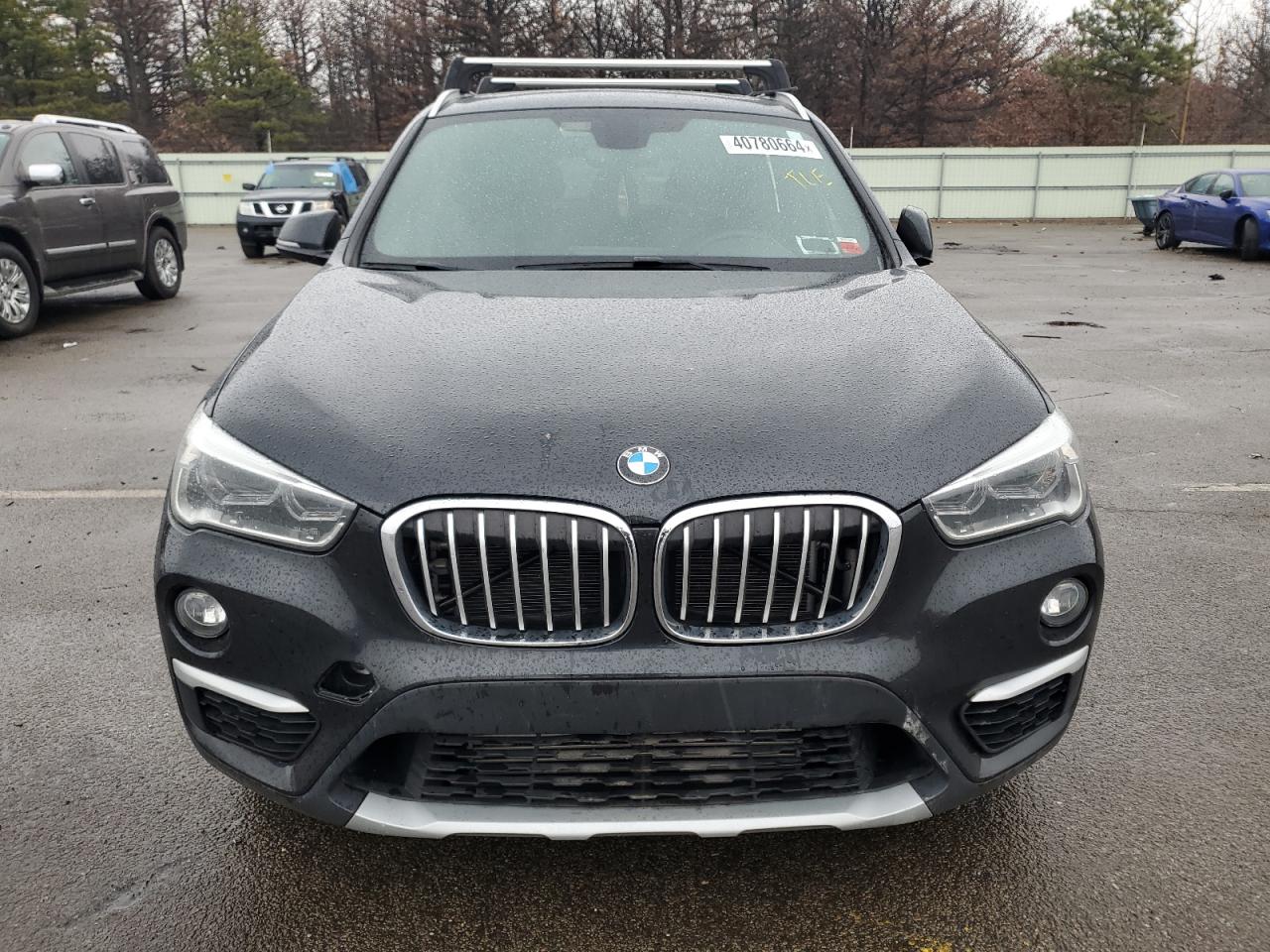 Photo 4 VIN: WBXHT3C33G5F65606 - BMW X1 