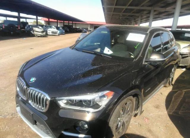 Photo 1 VIN: WBXHT3C33GP881668 - BMW X1 