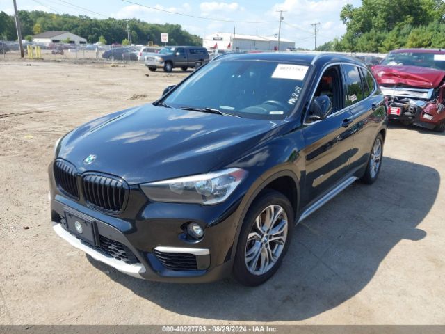 Photo 1 VIN: WBXHT3C33GP883436 - BMW X1 