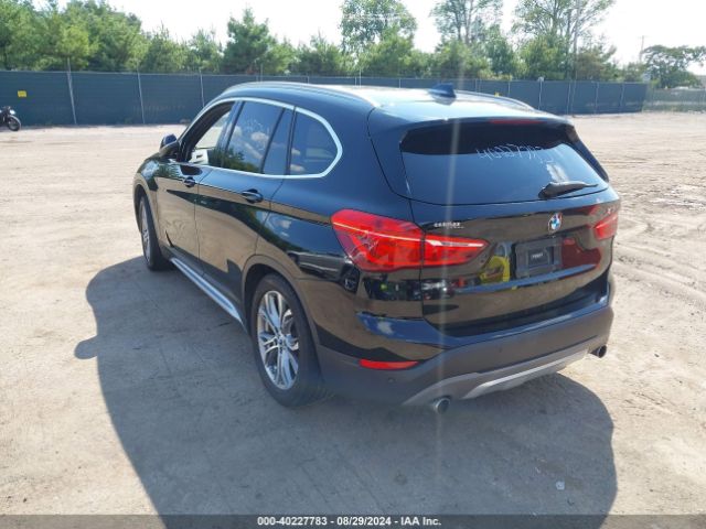 Photo 2 VIN: WBXHT3C33GP883436 - BMW X1 