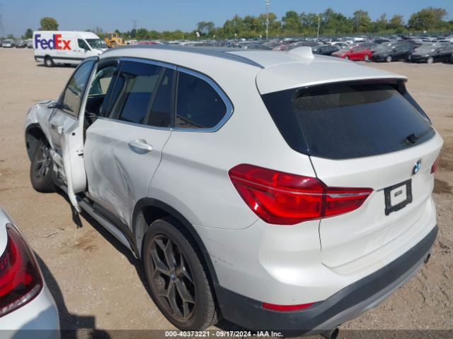 Photo 2 VIN: WBXHT3C33GP883582 - BMW X1 