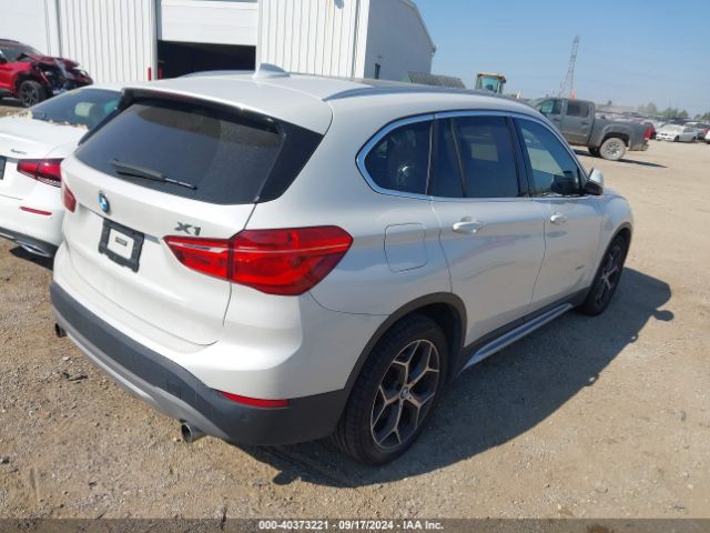 Photo 3 VIN: WBXHT3C33GP883582 - BMW X1 