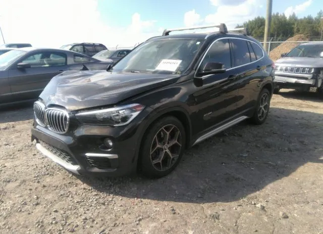 Photo 1 VIN: WBXHT3C33GP884070 - BMW X1 