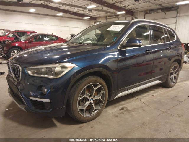 Photo 1 VIN: WBXHT3C33GP889267 - BMW X1 