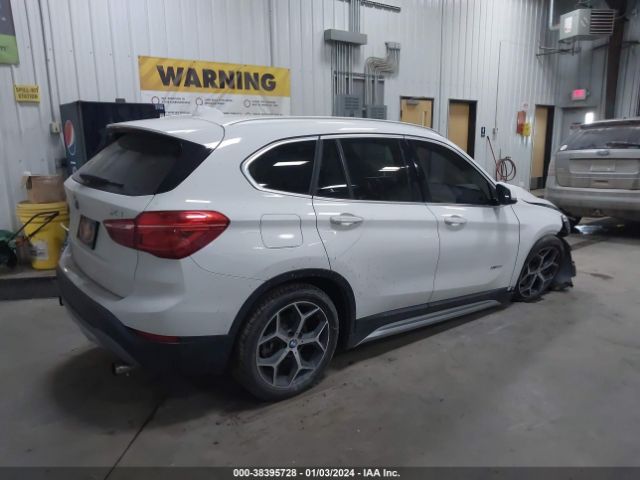 Photo 3 VIN: WBXHT3C33H5F69043 - BMW X1 