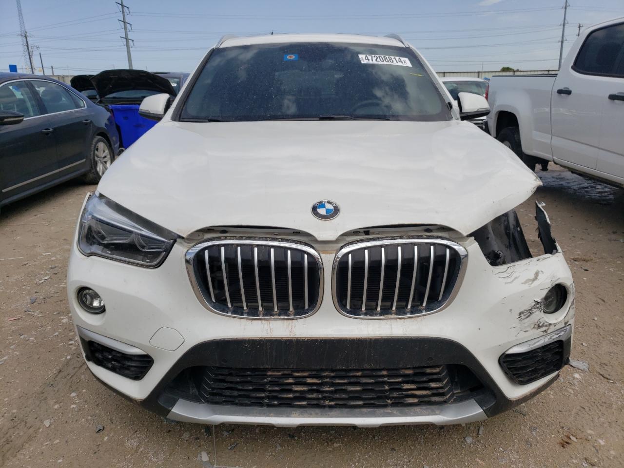 Photo 4 VIN: WBXHT3C33H5F70113 - BMW X1 