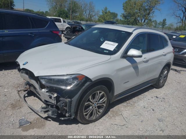 Photo 1 VIN: WBXHT3C33H5F73075 - BMW X1 