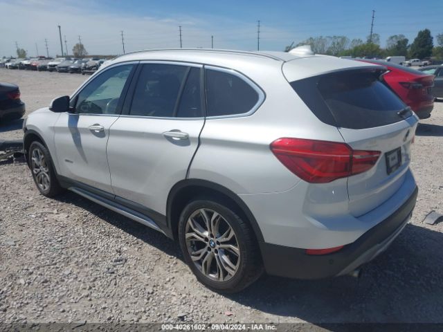 Photo 2 VIN: WBXHT3C33H5F73075 - BMW X1 