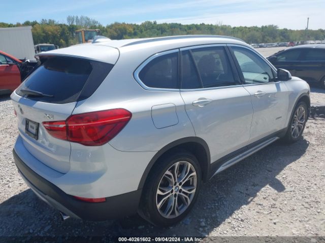 Photo 3 VIN: WBXHT3C33H5F73075 - BMW X1 