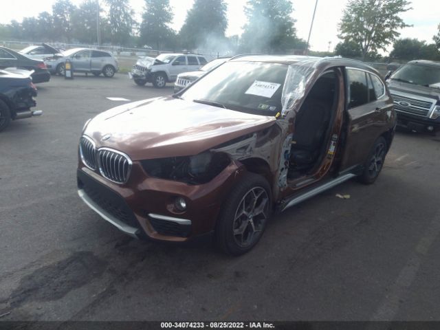 Photo 1 VIN: WBXHT3C33H5F73495 - BMW X1 