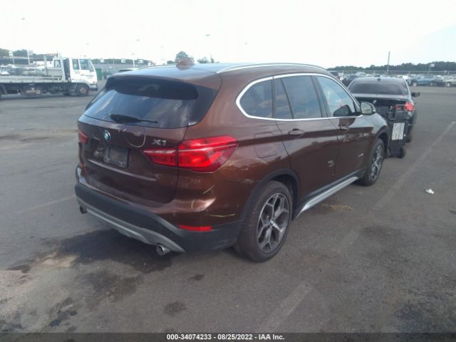 Photo 3 VIN: WBXHT3C33H5F73495 - BMW X1 