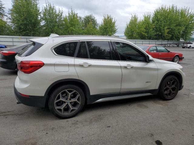 Photo 2 VIN: WBXHT3C33H5F76722 - BMW X1 