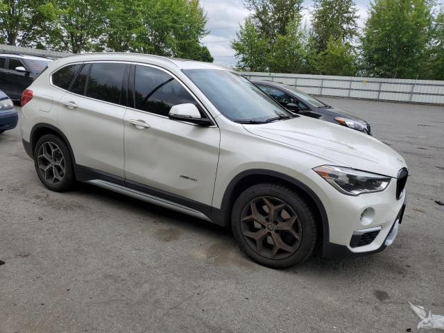 Photo 3 VIN: WBXHT3C33H5F76722 - BMW X1 