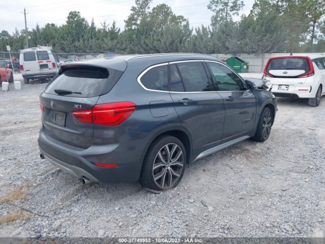 Photo 3 VIN: WBXHT3C33H5F77594 - BMW X1 