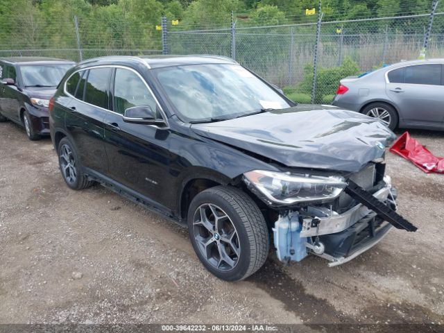 Photo 0 VIN: WBXHT3C33H5F77899 - BMW X1 