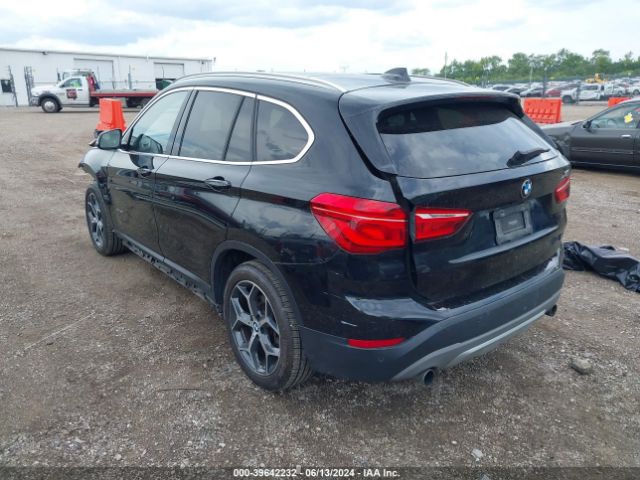 Photo 2 VIN: WBXHT3C33H5F77899 - BMW X1 