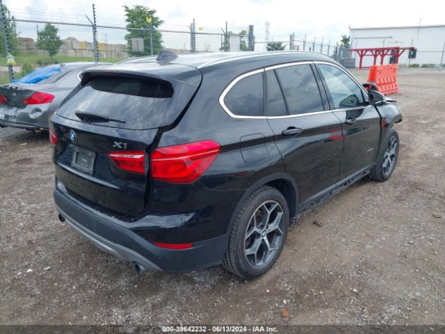 Photo 3 VIN: WBXHT3C33H5F77899 - BMW X1 